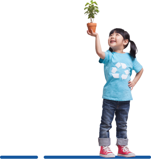 photo of child holding a potted plant